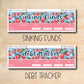 a pair of pink stickers that say sinking finds and debt tracker
