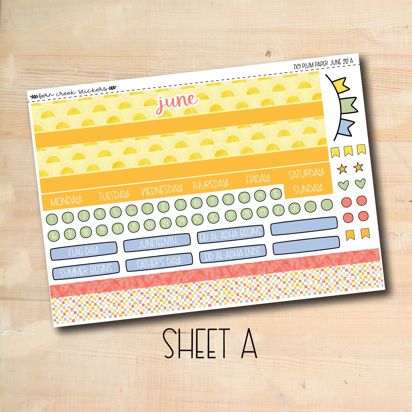 a yellow and orange planner sticker with the words june on it