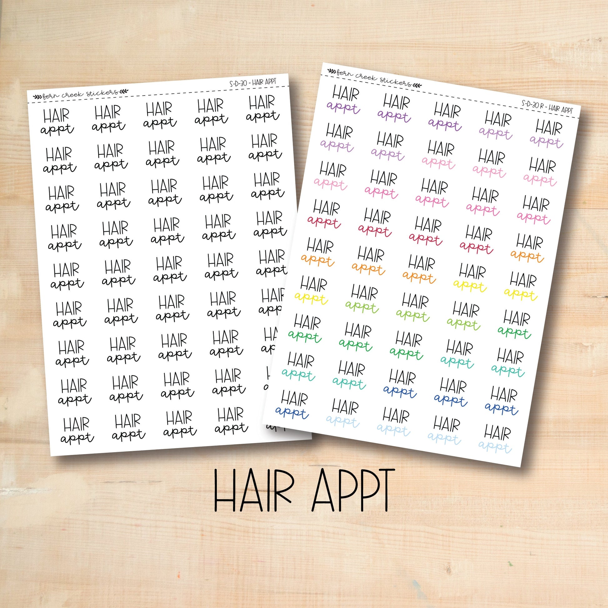 two stickers with the words hair app written on them