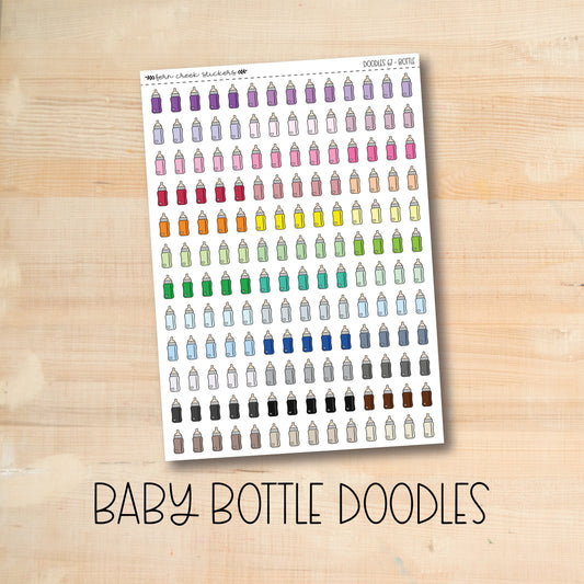 a baby bottle doodles sticker on a wooden surface