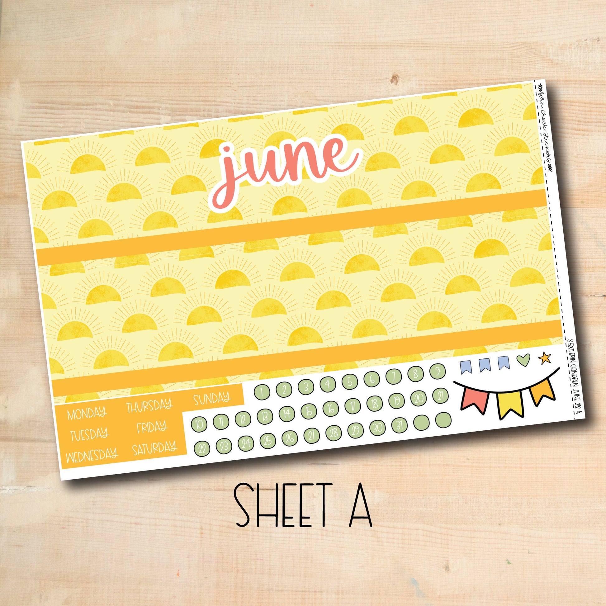 a yellow and white paper with the word june on it
