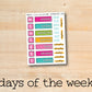 the days of the week sticker on a wooden surface