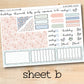 a sheet of stickers with a wooden background