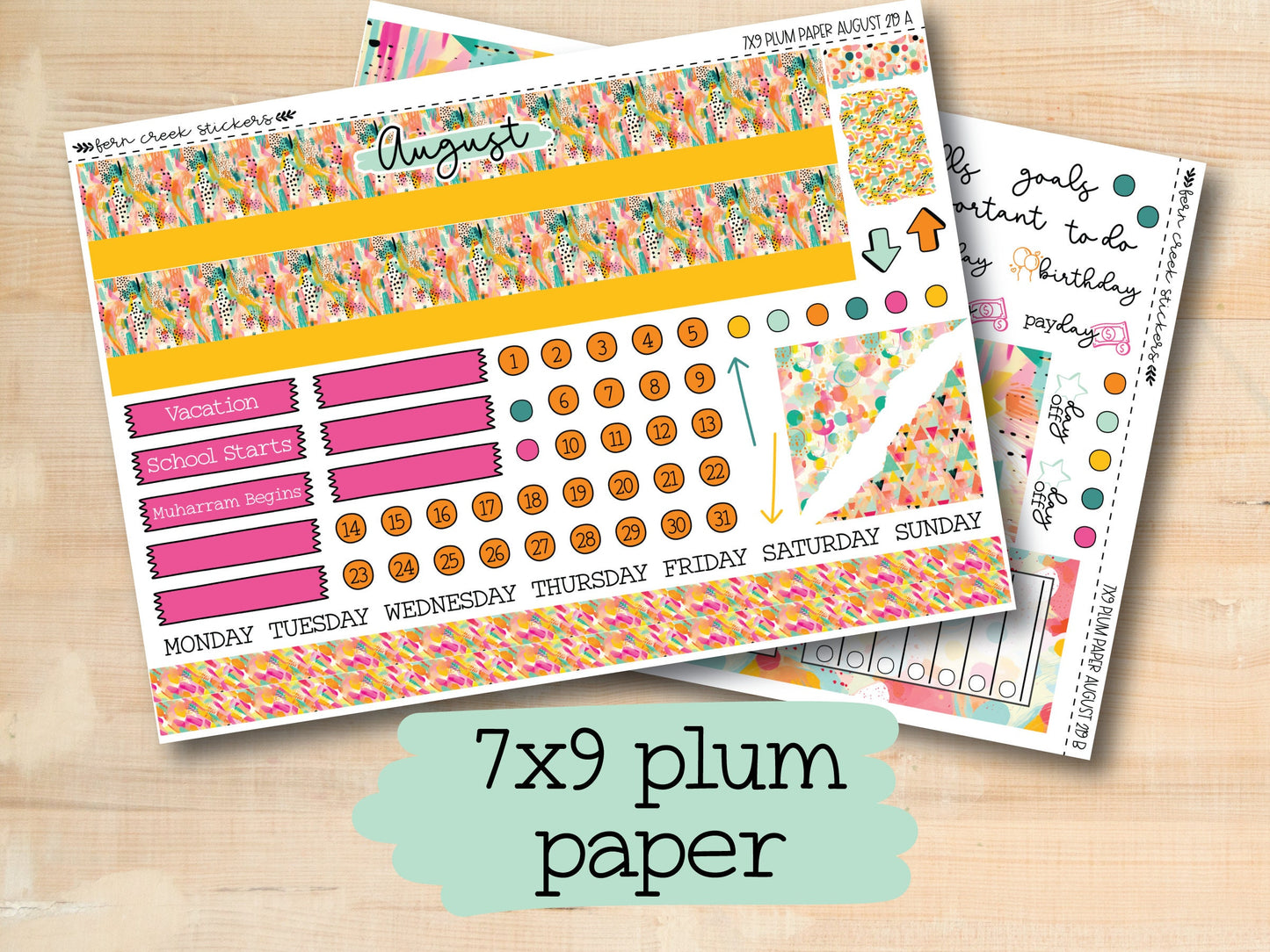 a variety of planner stickers on a wooden surface