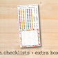 a checklist and extra box on a wooden surface