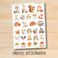 a sticker of various animals on a wooden surface