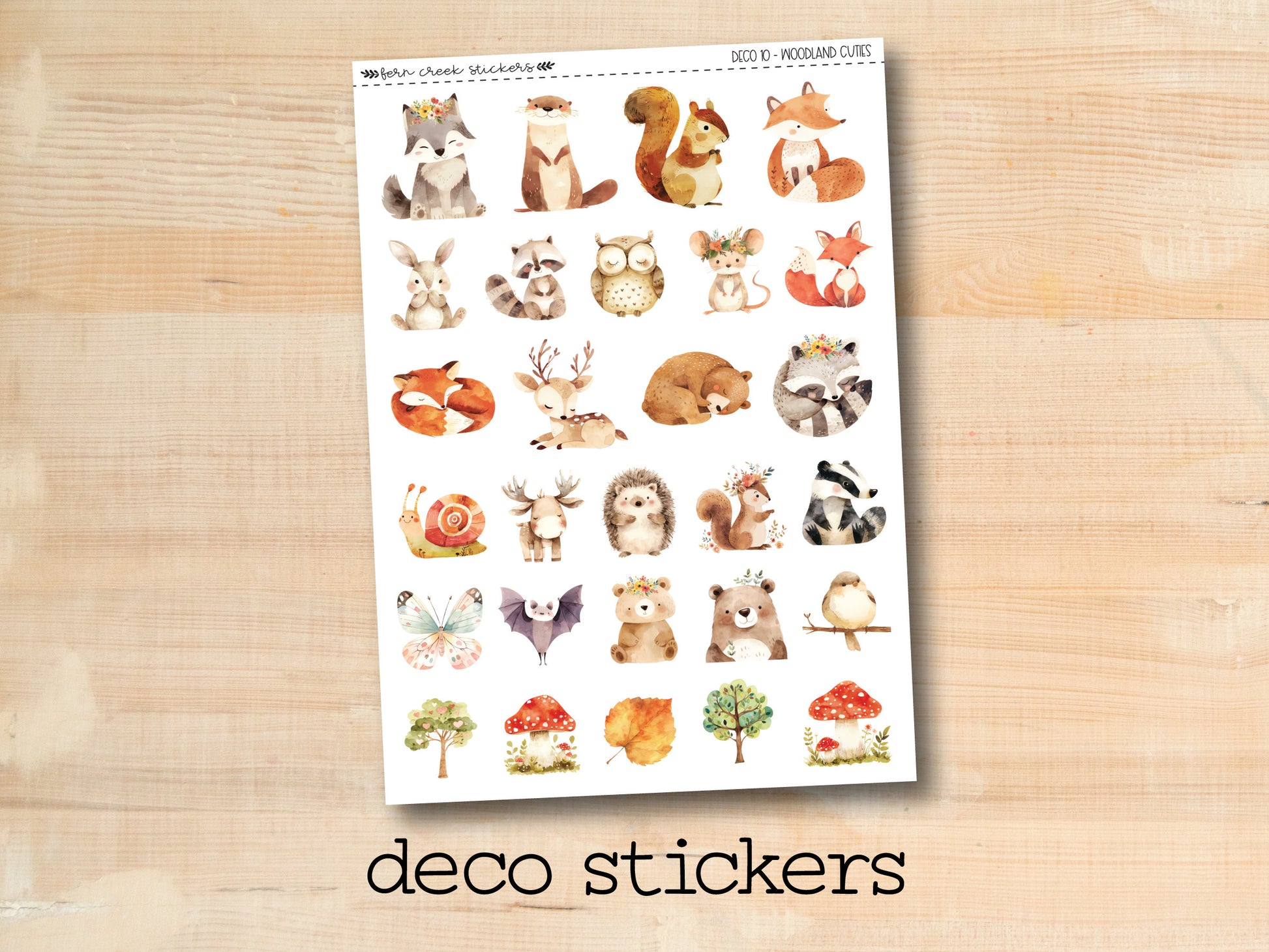 a sticker of various animals on a wooden surface