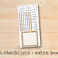 a checklist and extra box with a wooden background