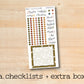 a checklist and extra box with a wooden background