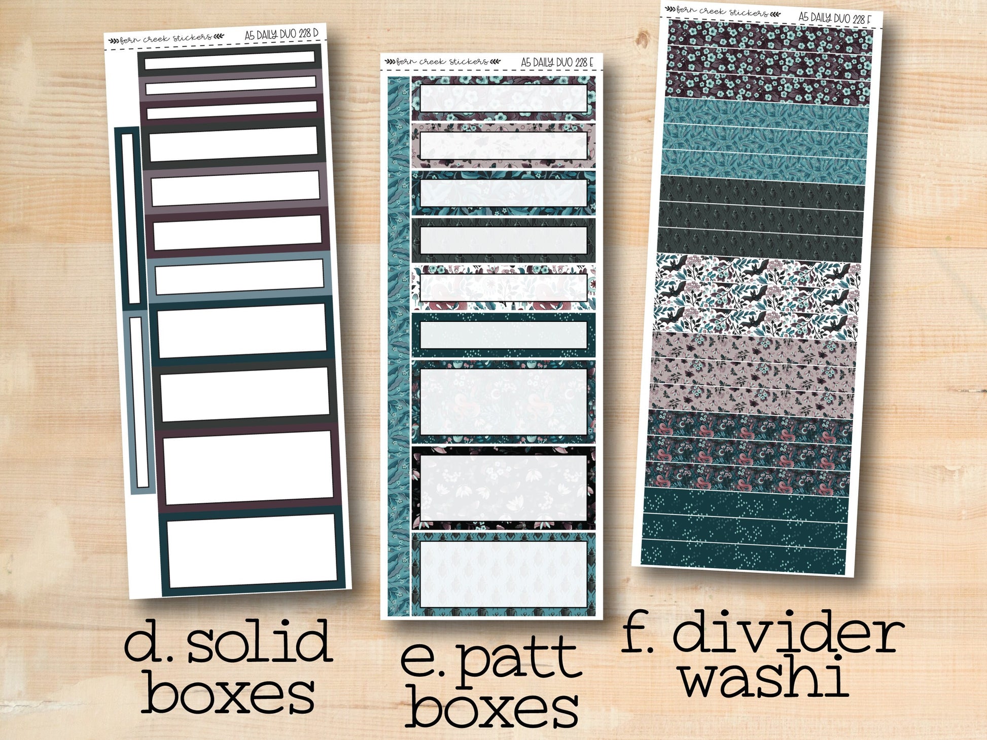 three different types of divider boxes on a wooden surface