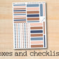 a close up of a sticker with the words boxes and checklists on it