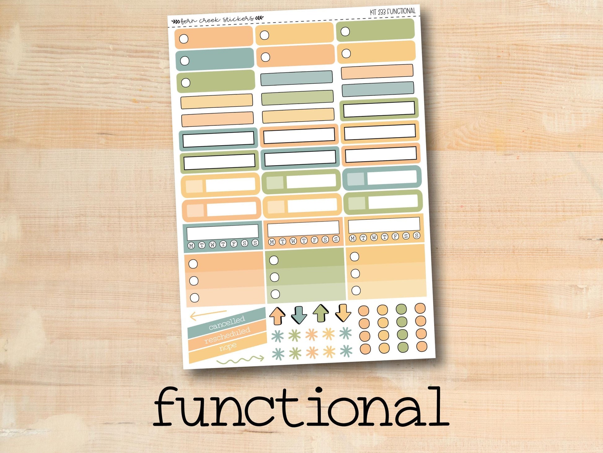 the functional planner sticker is shown on a wooden surface