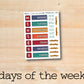 the days of the week sticker is displayed on a wooden surface