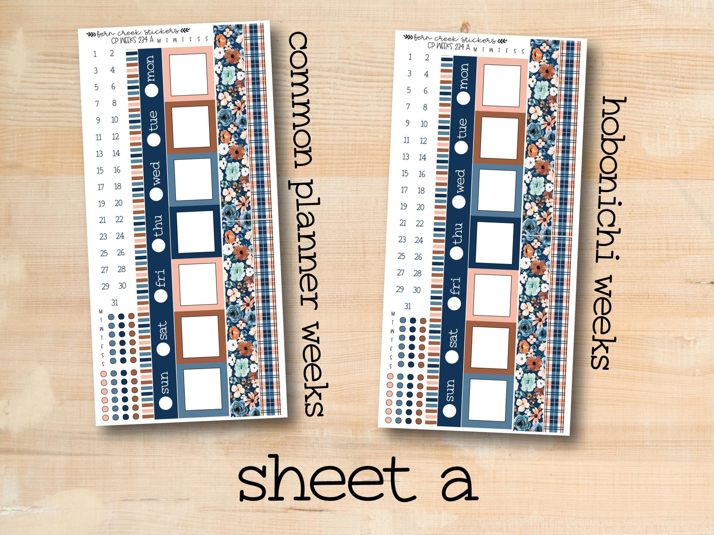 a wooden table topped with two blank photos