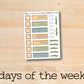 the days of the week sticker on a wooden surface