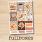 a sticker of fall boxes on a wooden surface