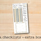 a checklist and extra box with a wooden background