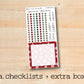 a checklist and extra box on a wooden surface