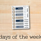 the days of the week stickers are displayed on a wooden surface