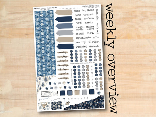 a sheet of paper with blue and white designs on it