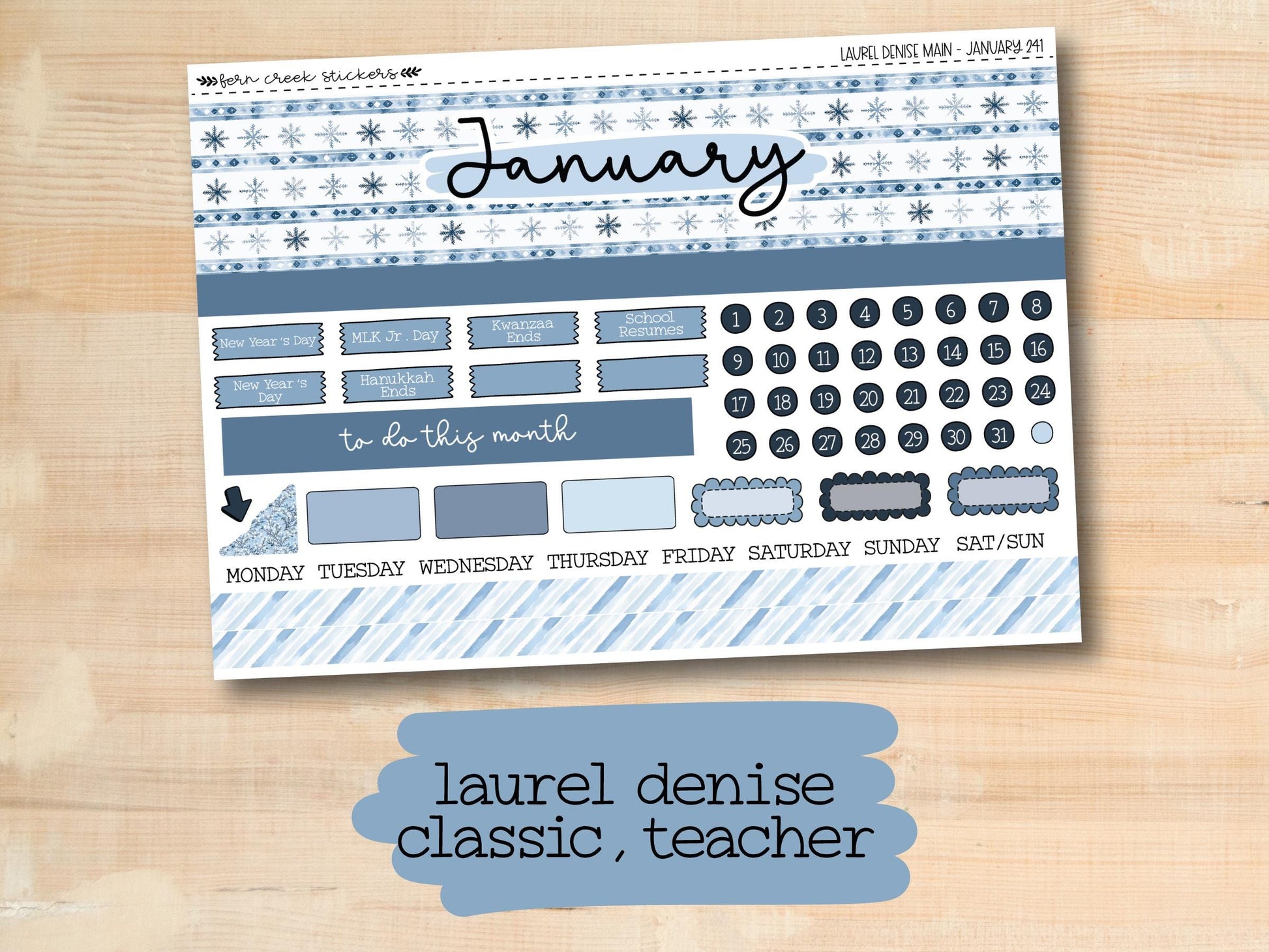 a blue and white planner sticker on a wooden surface