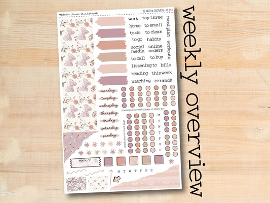 a sheet of stickers with a wooden background