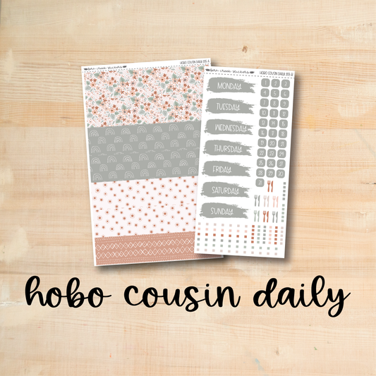 the hobo cousin daily stickers are on a wooden surface