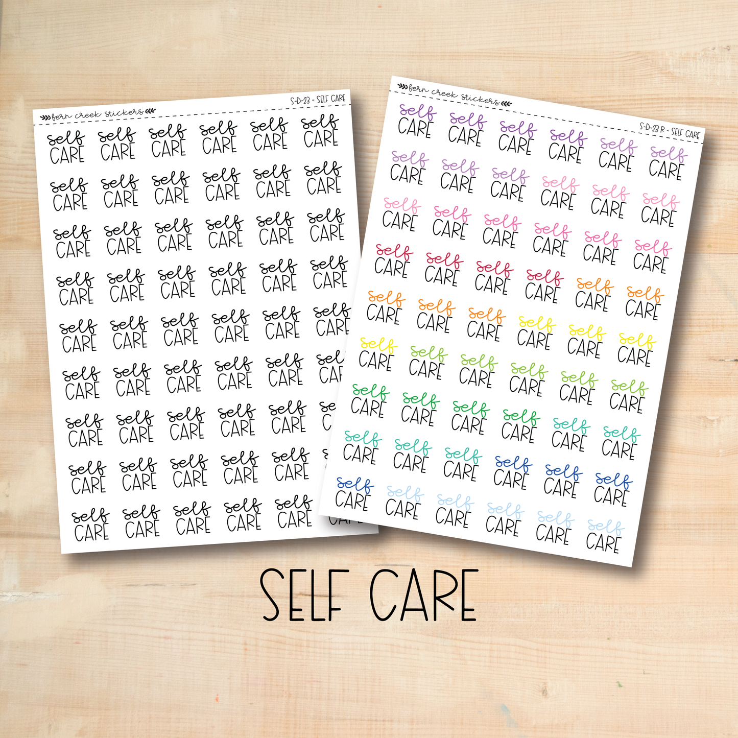 two sheets of self care stickers on a wooden surface