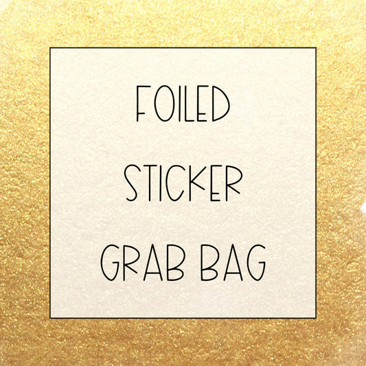 a white sign that says folded sticker grab bag