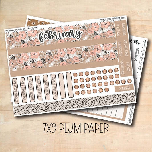 a pair of planner stickers with the words february on them