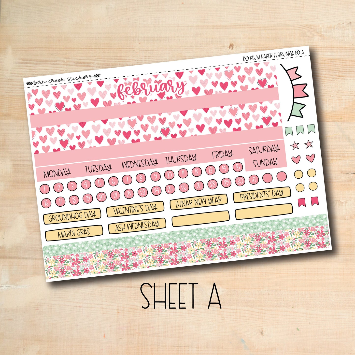 a pink and yellow planner sticker with hearts