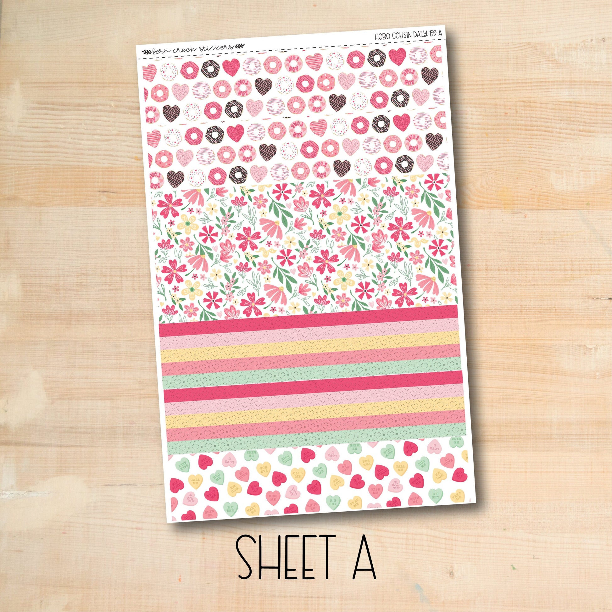 a sheet of paper with hearts and flowers on it