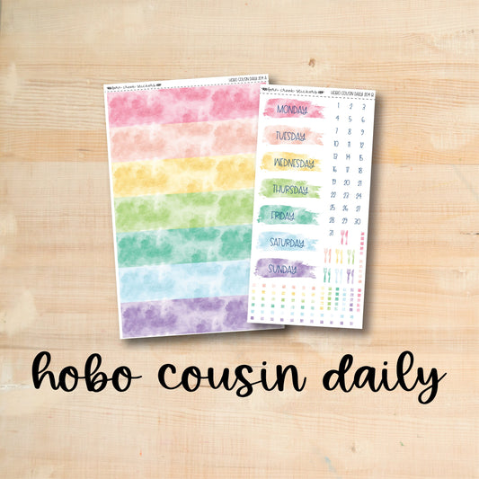 hobo cousin daily planner stickers on a wooden surface