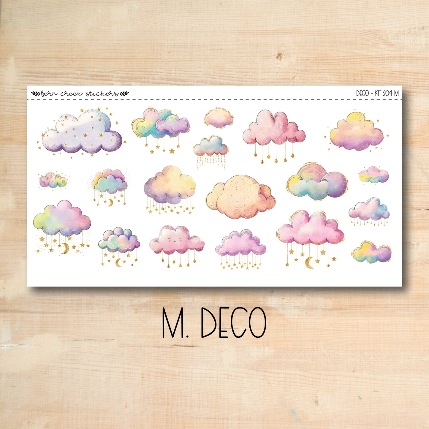 a sticker of clouds and rain on a wooden surface