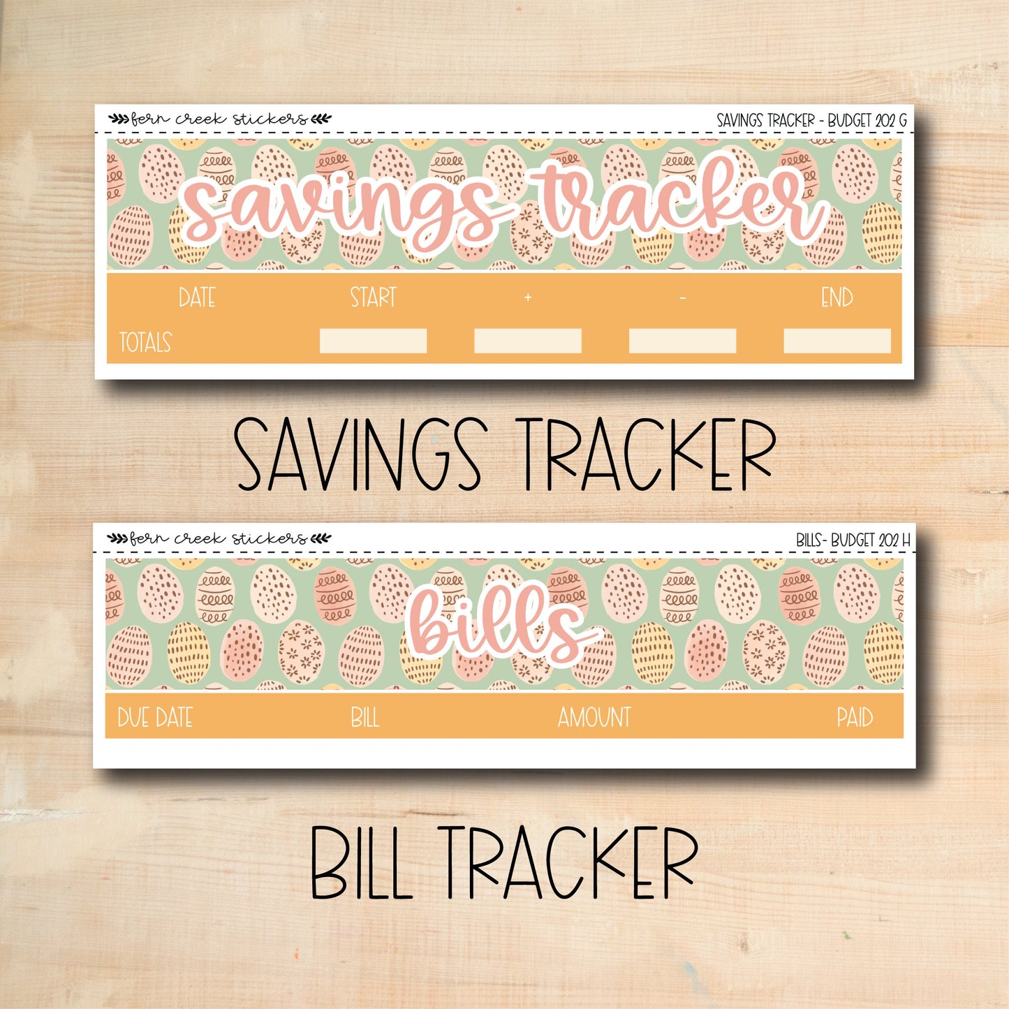two coupons for savings tracker on a wooden table