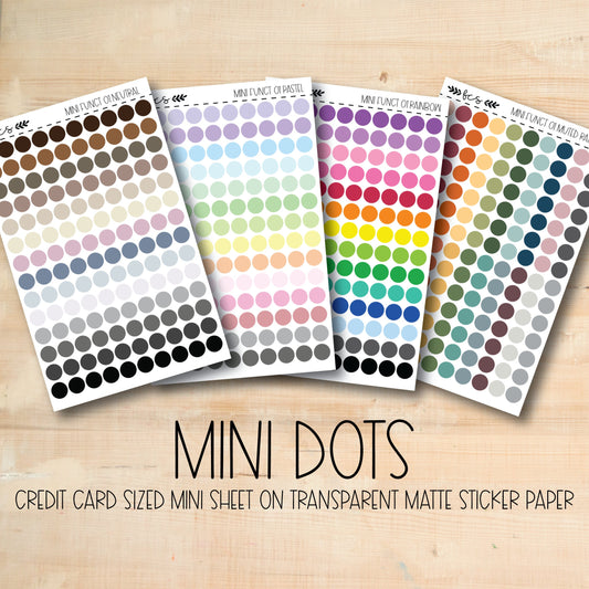 a set of five colorful stickers with dots on them