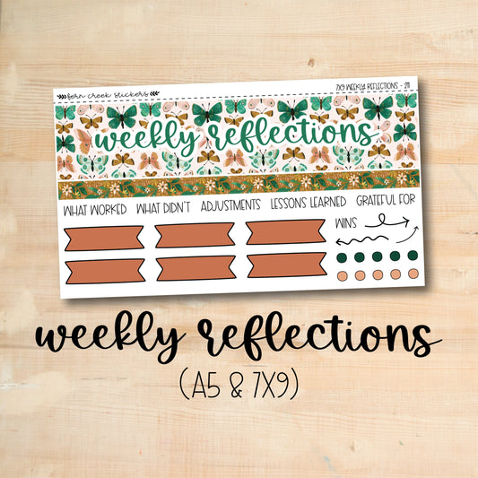 the weekly reflections stickers are on a wooden surface