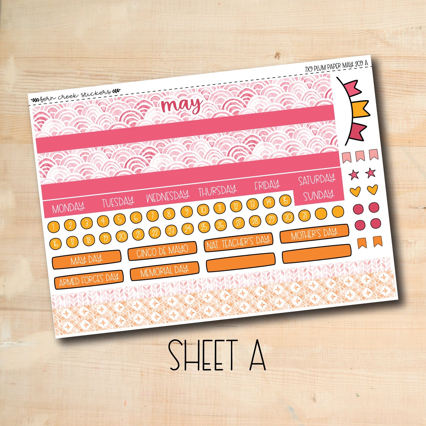 a pink and orange planner sticker with the word may on it