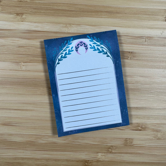 a notepad with a picture of a bird on it