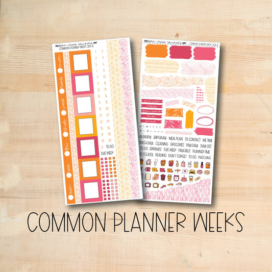 a wooden table topped with two planner stickers