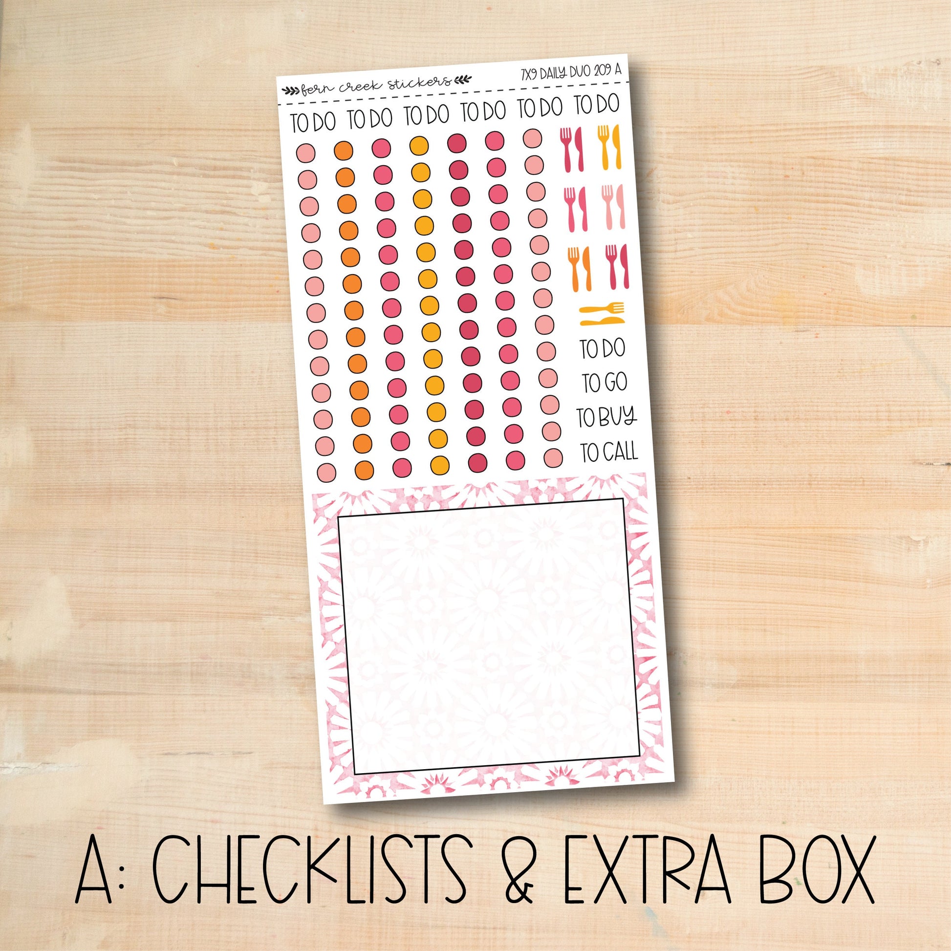 a checklist and extra box of stickers on a wooden surface