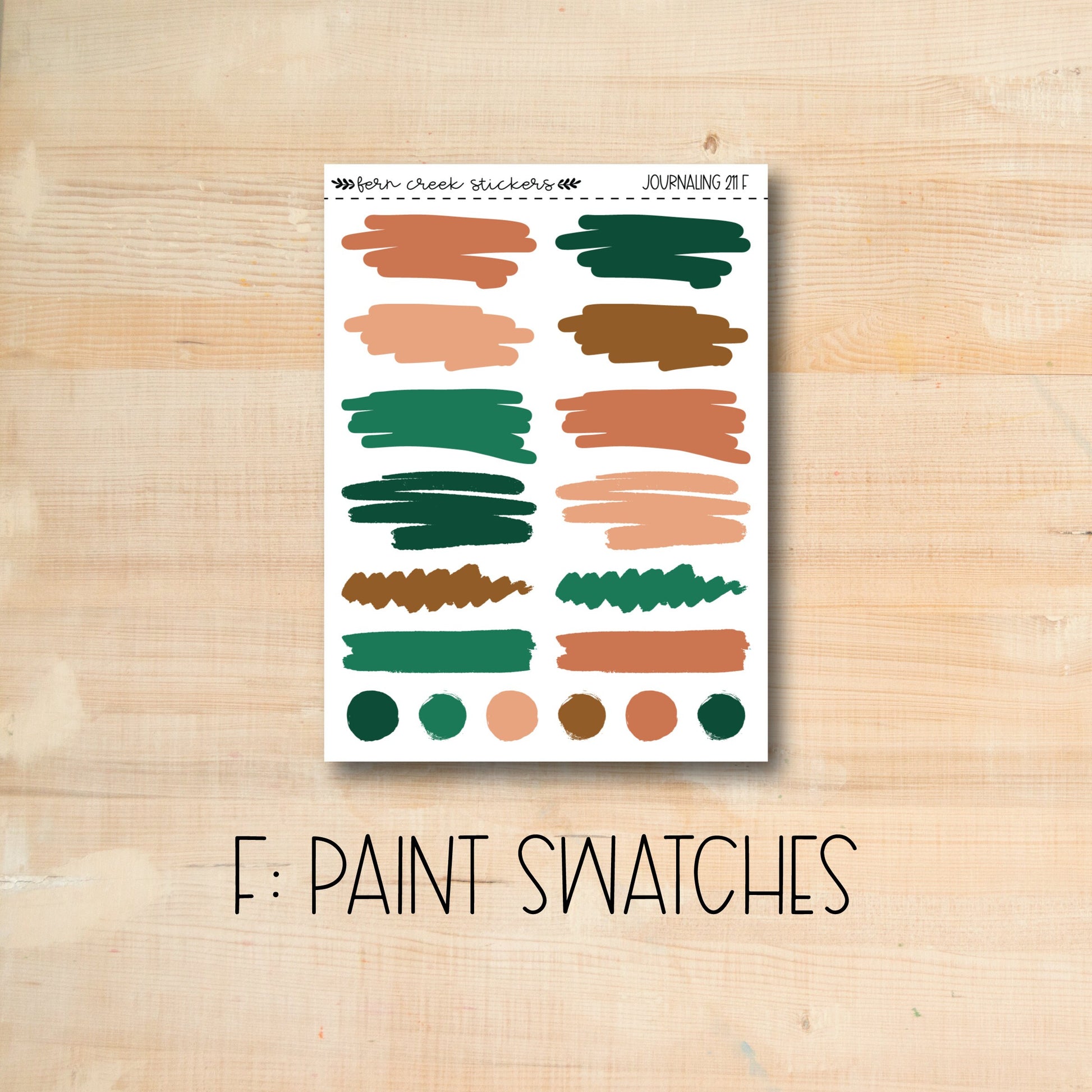 a picture of a wooden table with paint swatches